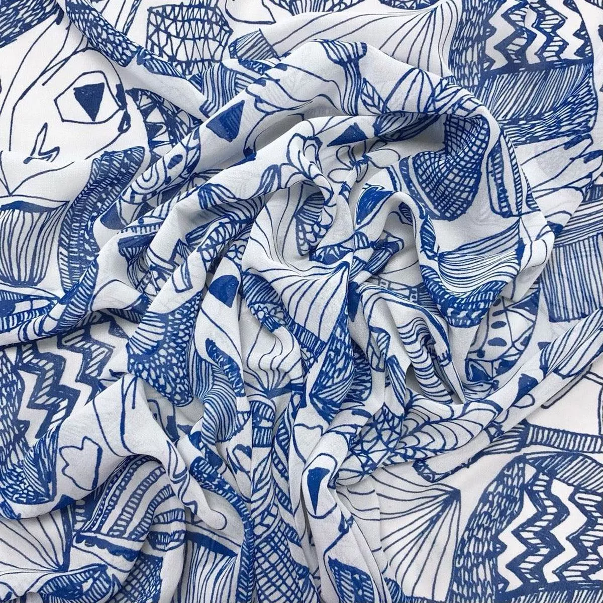 all-over-doodles-on-white-chiffon-fabric All Over Doodles on White Chiffon Fabric